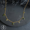 Geometric Charm Necklace with Green Emerald Accents